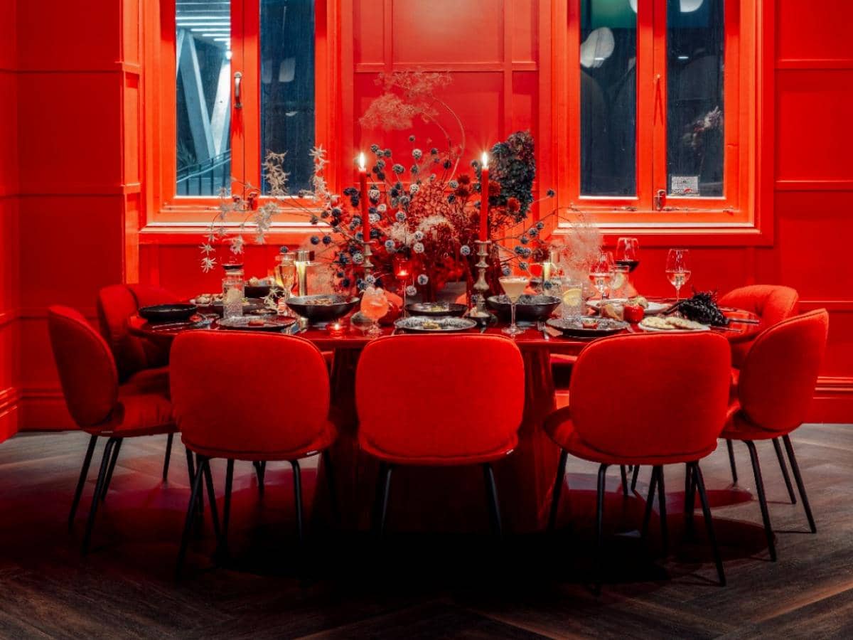 Red dining table Naumi Venue Hire